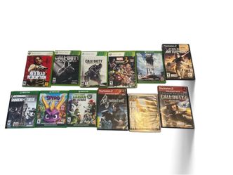 Lot of 12 used video games for Xbox One, Xbox 360, PlayStation 2, and PlayStation 3.