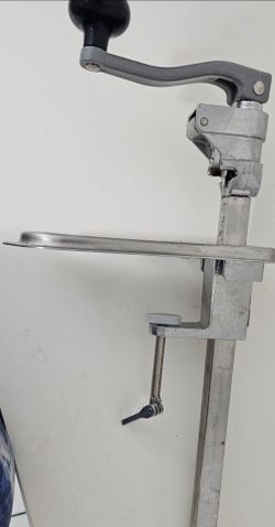 Heavy-duty manual commercial can opener. Pre-owned