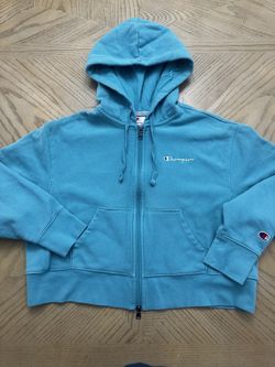 Champion women's cropped fleece zip-up sweatshirt in teal blue. Size medium 