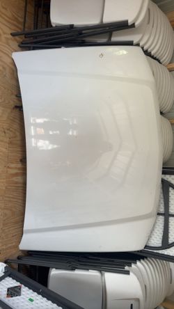 OEM white automotive hood (GM Part Number: 1(contact info removed))