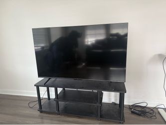 50” TCL TV with TV stand