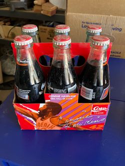 Vintage commemorative Coca Cola 6-pack bottles