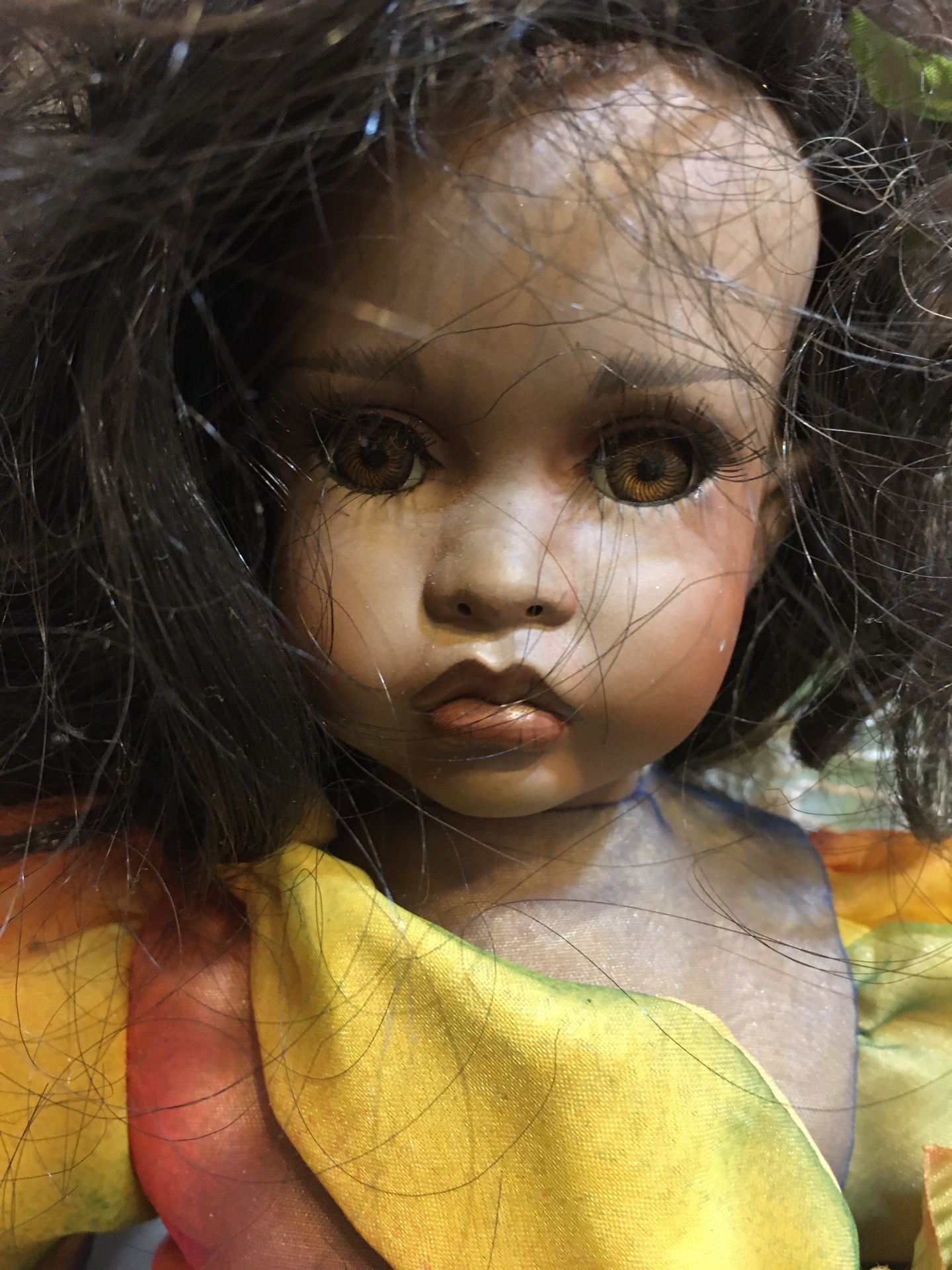 Beautiful mixed race little girl doll