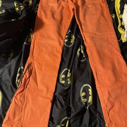 Orange Flare Stacked Jeans