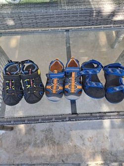 kids sandals  all from 10$ blue ones size 7and the black One size 8