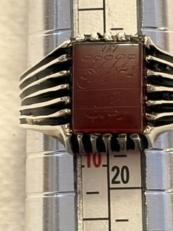 men's ring, typically crafted from silver and featuring a agate