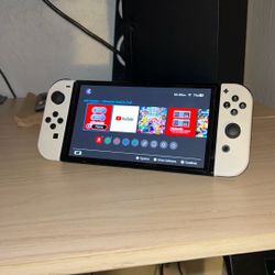 OLED Nintendo Switch+ Pro Controller + Smash Bros 