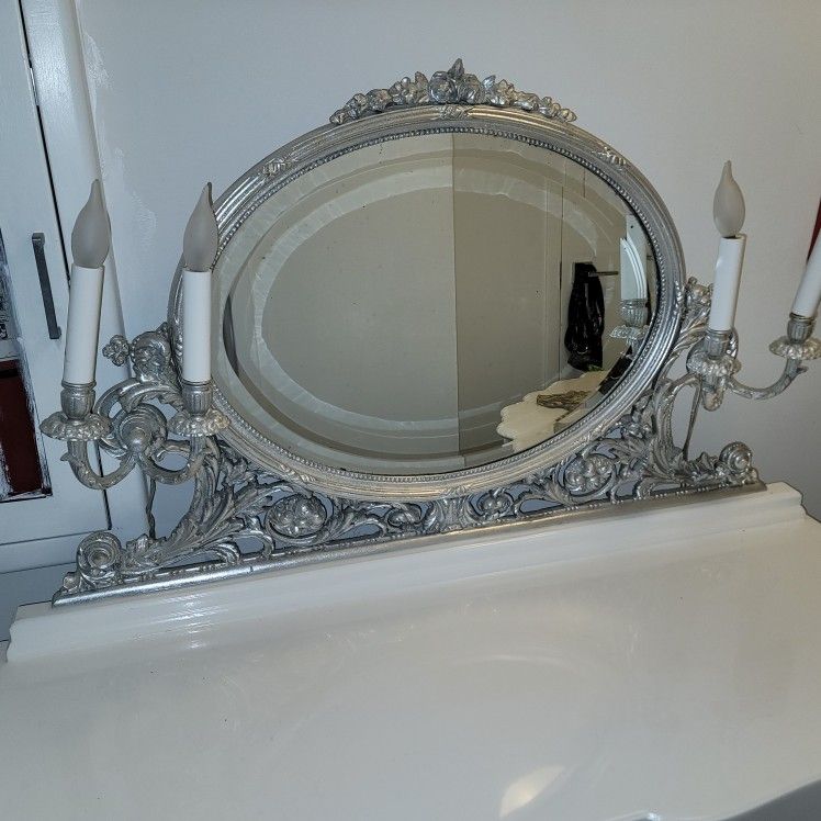 Table With Mirror And Candleabras