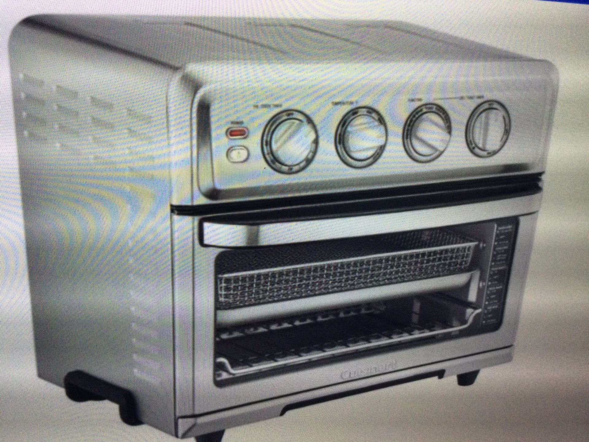 CUISINART - AIR FRYER TOASTER OVER WITH GRILL-STAINLESS STEEL…TOA-70. OPEN BOX COMES COMPLETE RETAILS AT 229.95 PLUS TAX