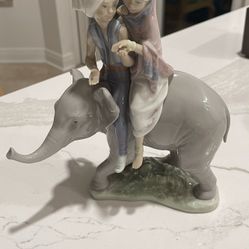 Llardo Hindu children Sitting On Elephant
