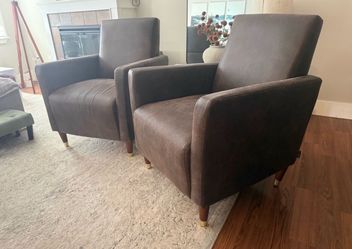 Two Brown Faux Leather Chairs