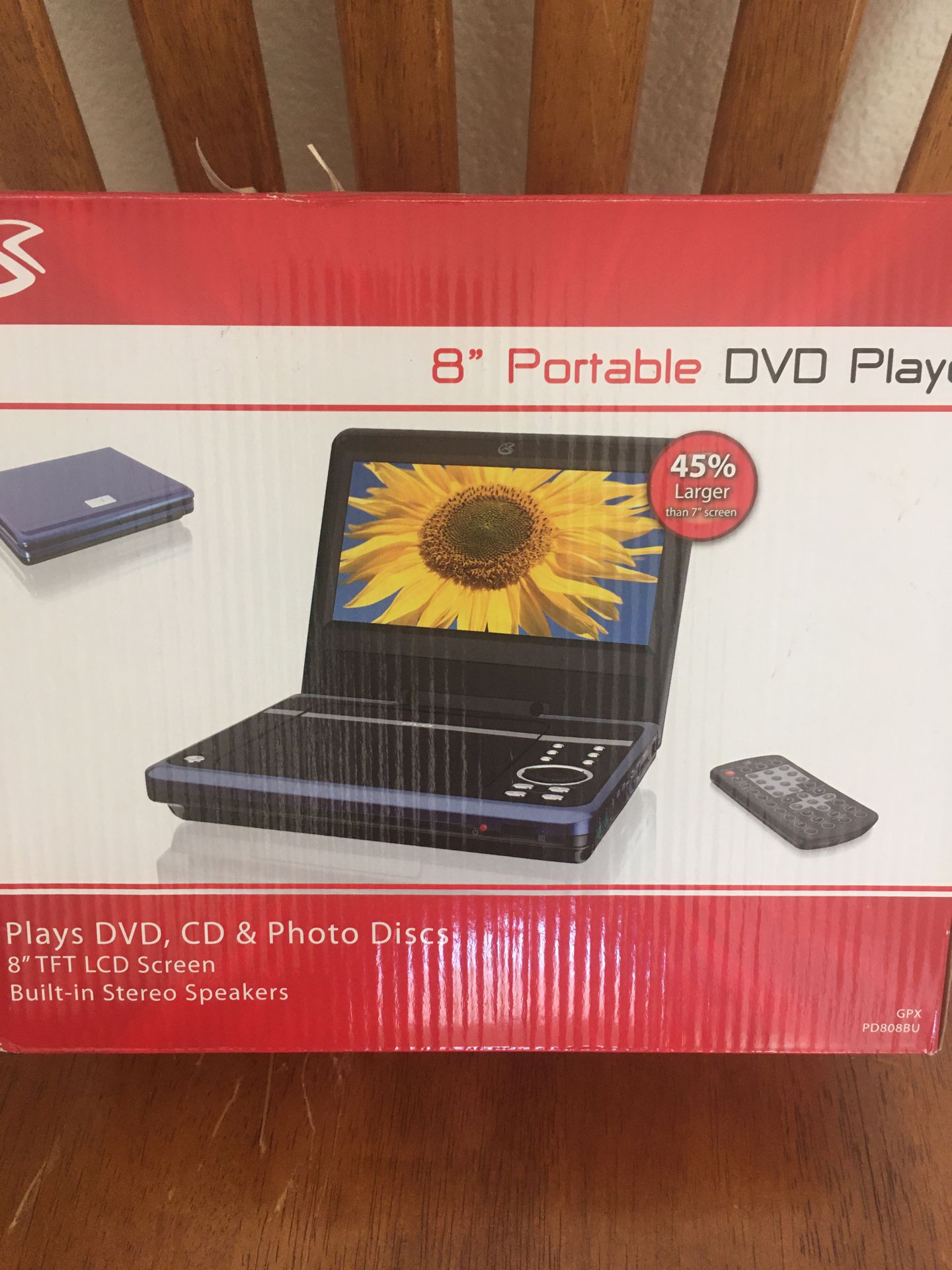 Portable DVD, CD, and photo disc player