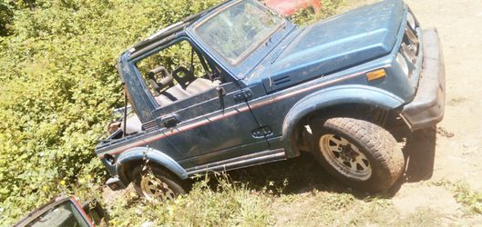 89  turquoise blue Suzuki Samurai