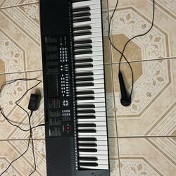 Piano with microphone