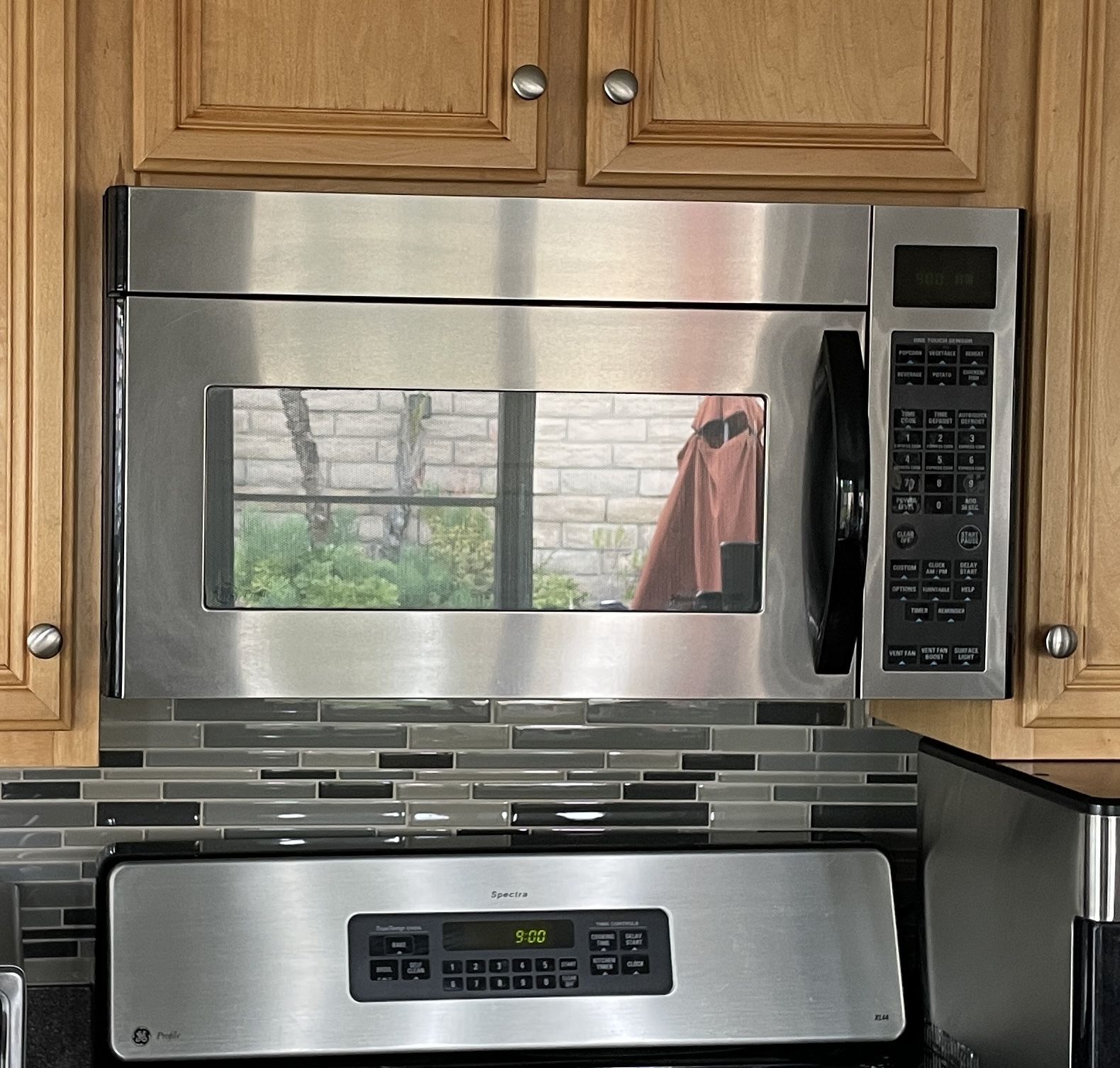 GE Profile Spacemaker XL1800 1.8 cu. ft. Over The Range Microwave Oven