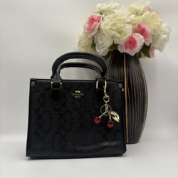 Black Coach Bag With Cherry Charm 