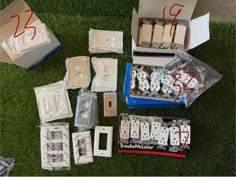 Assorted Electrical Outlets Switches and Wall Plates