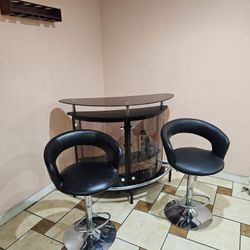 BAR GLASS 52" WIDE X 42" TALL WITH STOOLS SET,FOR SALE ALL TOGETHER CURVE BAR,LEATHER ADJUSTABLE STOOLS NICE AND CLEAN LUXURY DESIGN IF SOMEBODY INTER