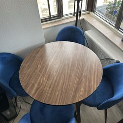 Almost New Round Dining Table with Blue Chairs
