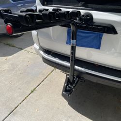 Sturdy PRO SERIES hitch mount bike rack. Holds 4 bikes. Black color. Ready to go for your next adventure.