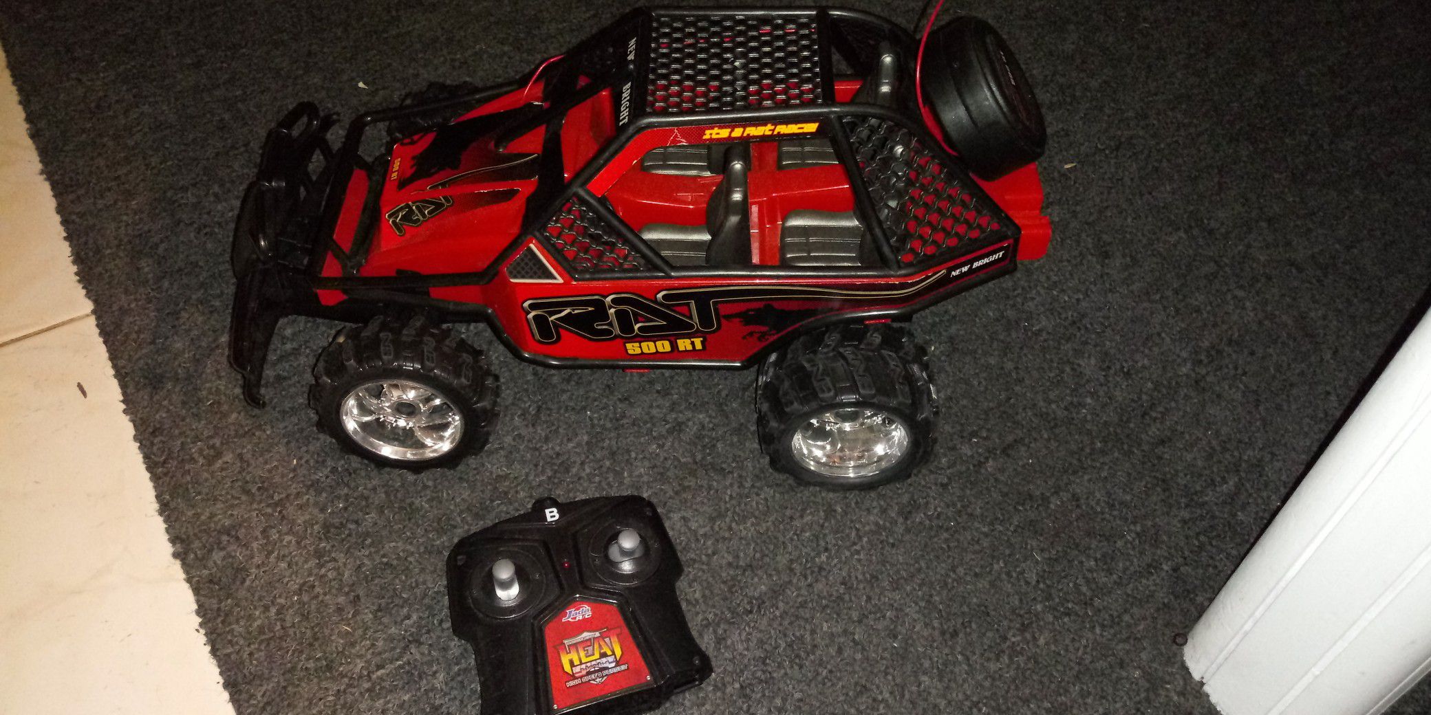 Remote control red buggy car with remote good condition 8 inches tall x 15 long