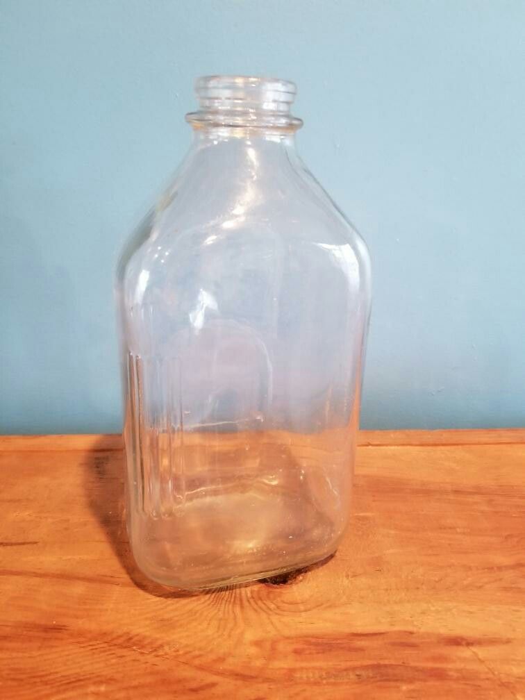 Antique gallon glass milk bottle