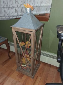 tall word and metal lantern