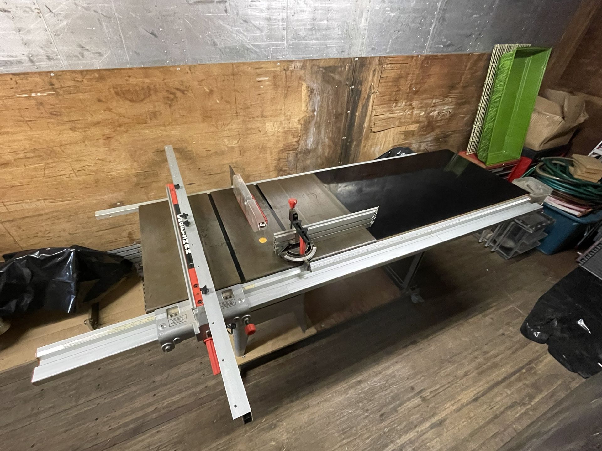 10" Craftsman table saw with rolling platform, wing, and accessories