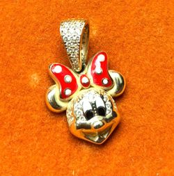 Gold Minnie Mouse pendent and Gold Minnie Mouse bracelet. MINNIE MOUSE BRACELET NEEDS FIXING where bracelet clips! 14k both bracelet and pendant.  Wei