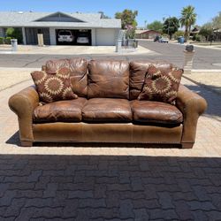 Alexander Sinclair, down-filled high-end leather couch,