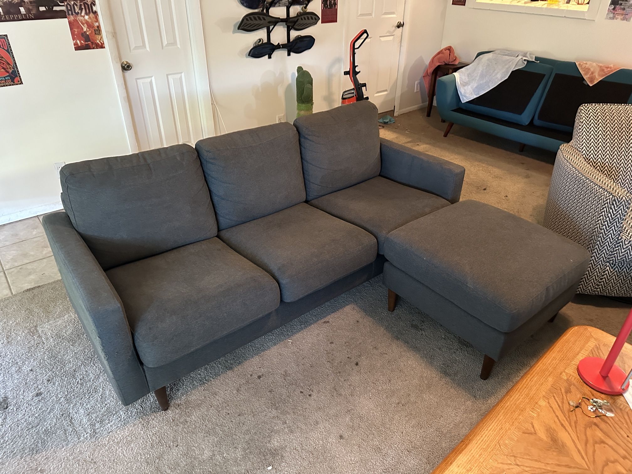 Grey Fabric couch with matching ottoman