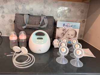 Spectra S1 plus breast pump + Cary bag +4 extra flangs + free bottles