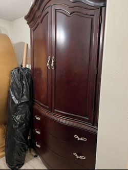 Michael Armini large Armoire has minor scuffs