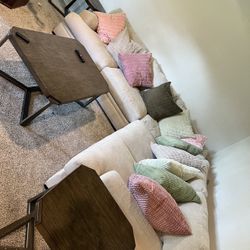 Sectional couch with tables