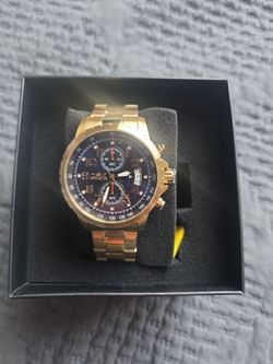 Invicta gold style watch