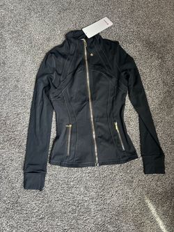 LuLu lemon top black and gold size 4