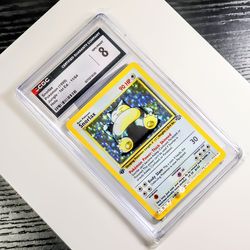 1999 Pokemon Jungle 1st Edition Rare Holofoil #11 Snorlax - CGC 8 (under graded)