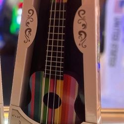 UKULELE WITH ADJUSTABLE TUNING PEGS 6" X 16"