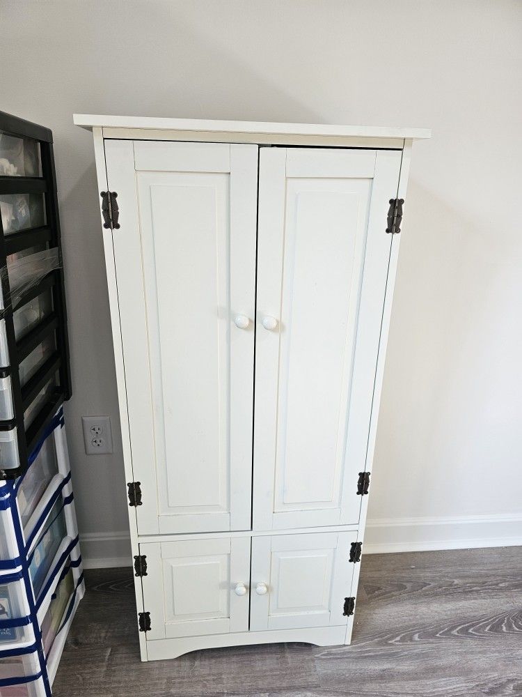 New, never used slim white 4 Shelve Cabinet