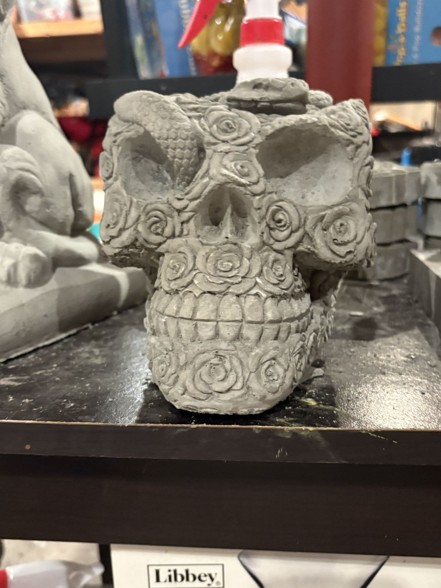 Concrete Skull Statue with Rose & Snake Design