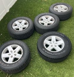 Stock Jeep wheels off 2015 Jeep Wrangler
