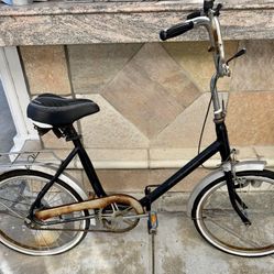 Vintage bicycle. Has rust on some parts. 