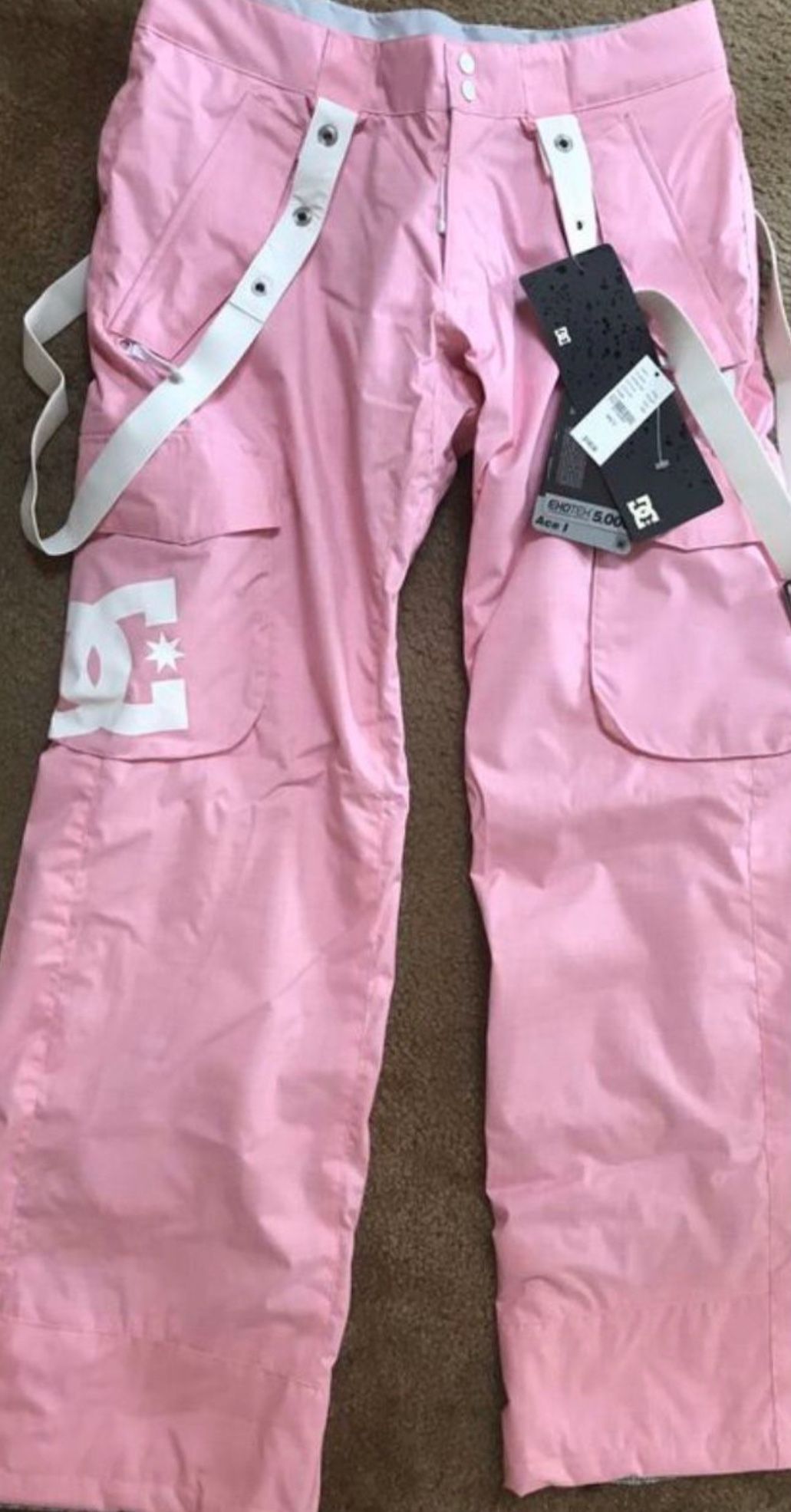 Brand new DC snowboard pants! Pink! Size M Paid 160 with tax and shipping.