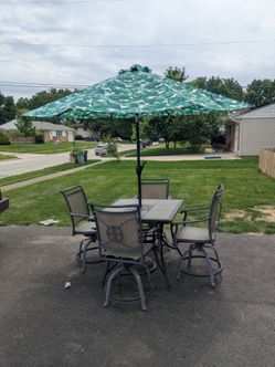 Patio Table, Chairs, and Umbrella