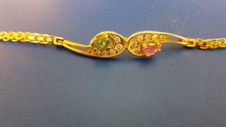 14k gold with tourmalines and diamonds