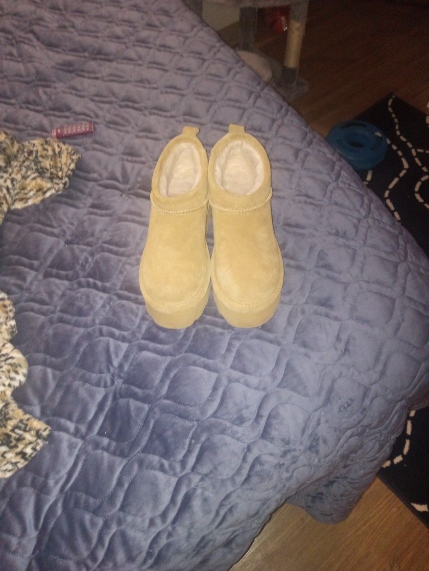 Pair Of Bear paw boots