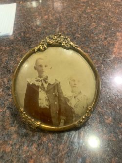 Antique Victorian brass gold tone frame with very old photo