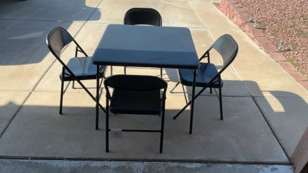 five-piece folding card table and chair set. 