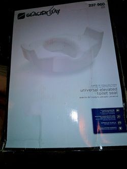 Glacier Bay Universal Elevated White Toilet Seat Model 237 960