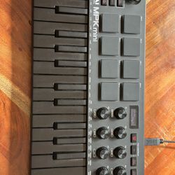 Akai Mpk Mini (25 Key Midi Keyboard And Controller)